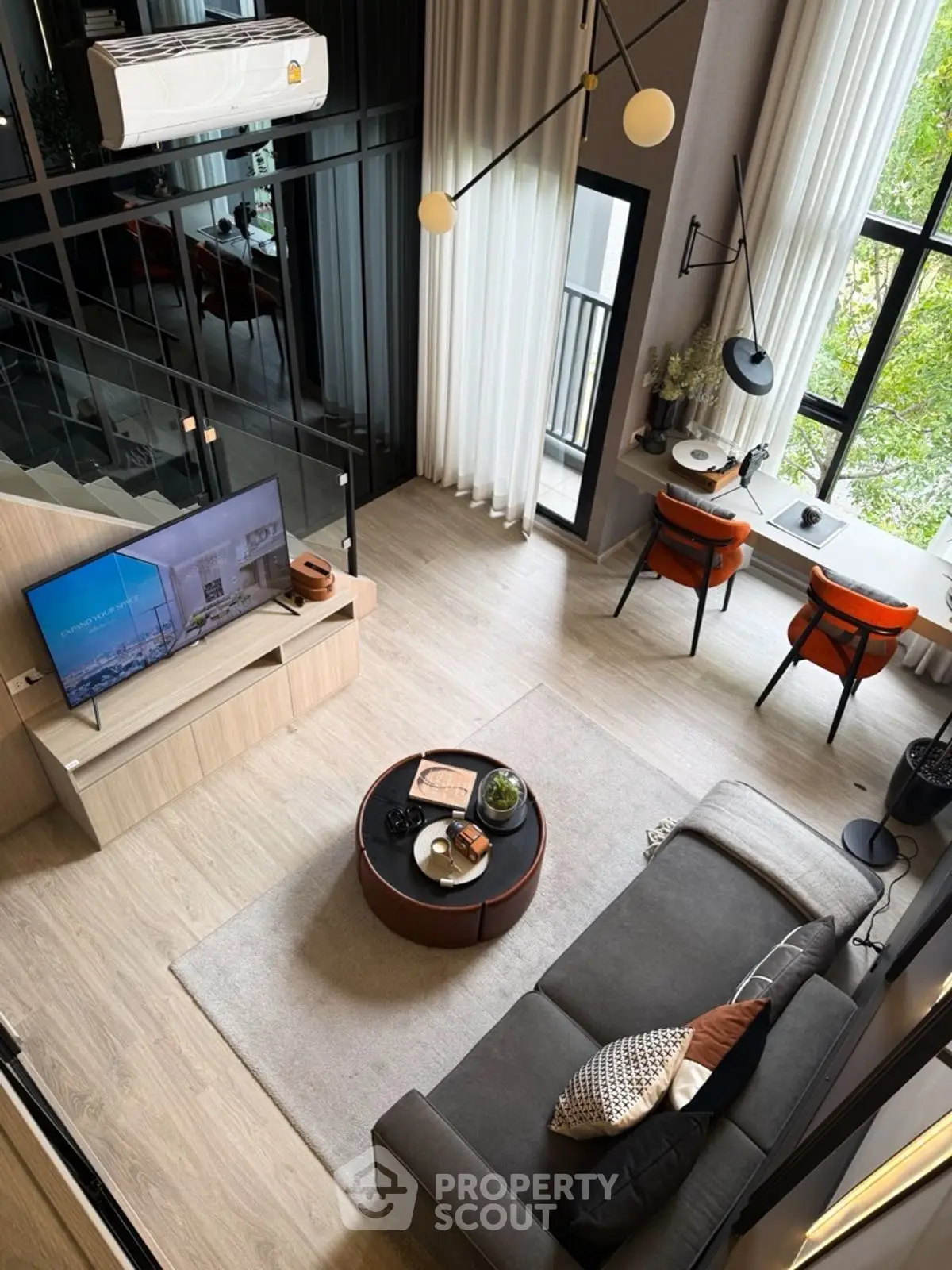 Modern loft living room with high ceilings and stylish decor