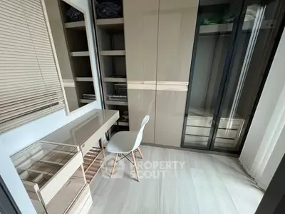 Modern study room with sleek furniture and ample storage space