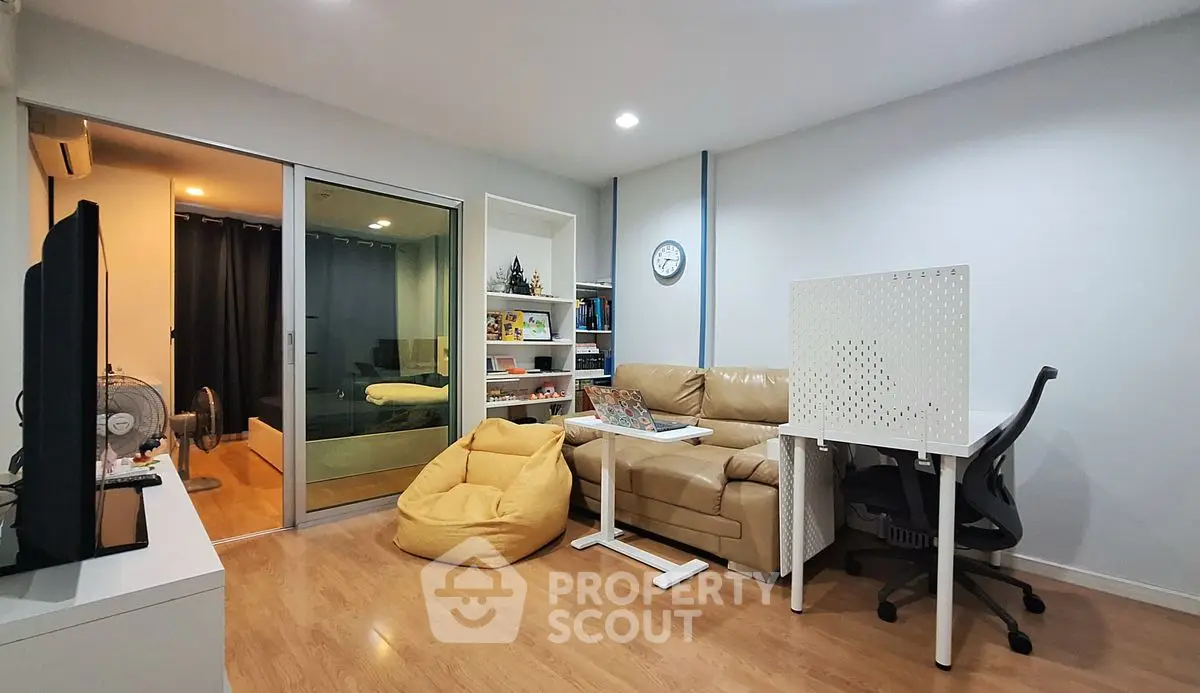 Modern living room with cozy seating and stylish decor