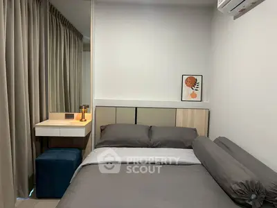 Cozy modern bedroom with stylish decor and natural light