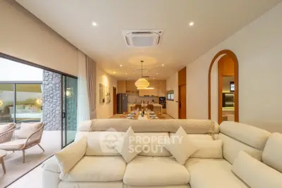 Luxurious open-plan living room with elegant decor and spacious layout