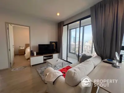 Modern living room with city view and balcony access