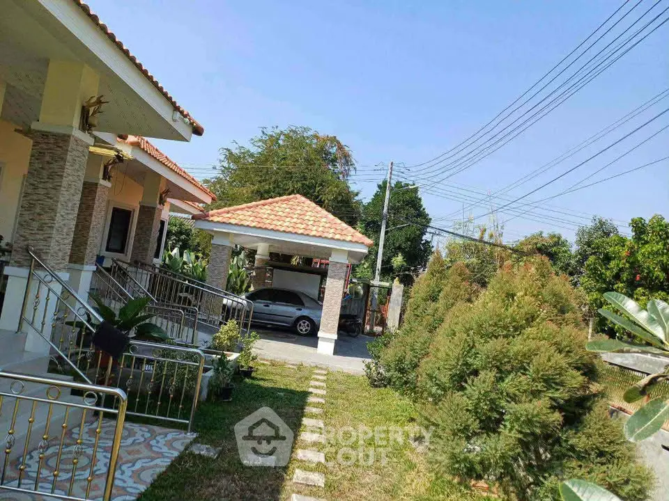 Charming suburban home with spacious garden and carport, perfect for family living.