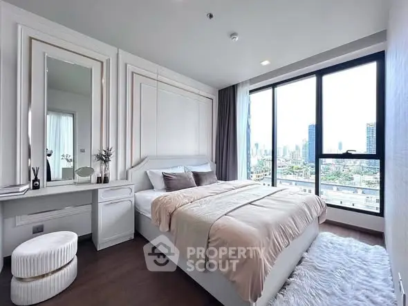 Luxurious bedroom with city view and elegant decor
