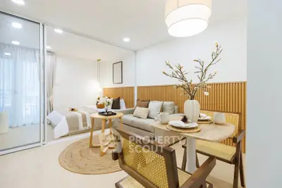 Modern open-plan living room with cozy dining area and stylish decor