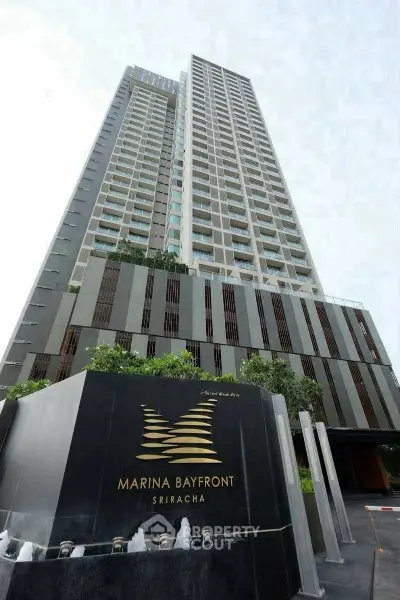 Stunning high-rise building exterior of Marina Bayfront Sriracha with modern architectural design.