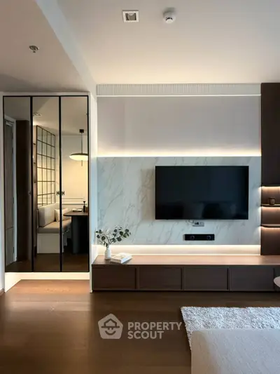 Modern living room with sleek TV setup and stylish decor