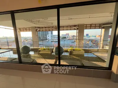 Spacious balcony with city view and modern design elements