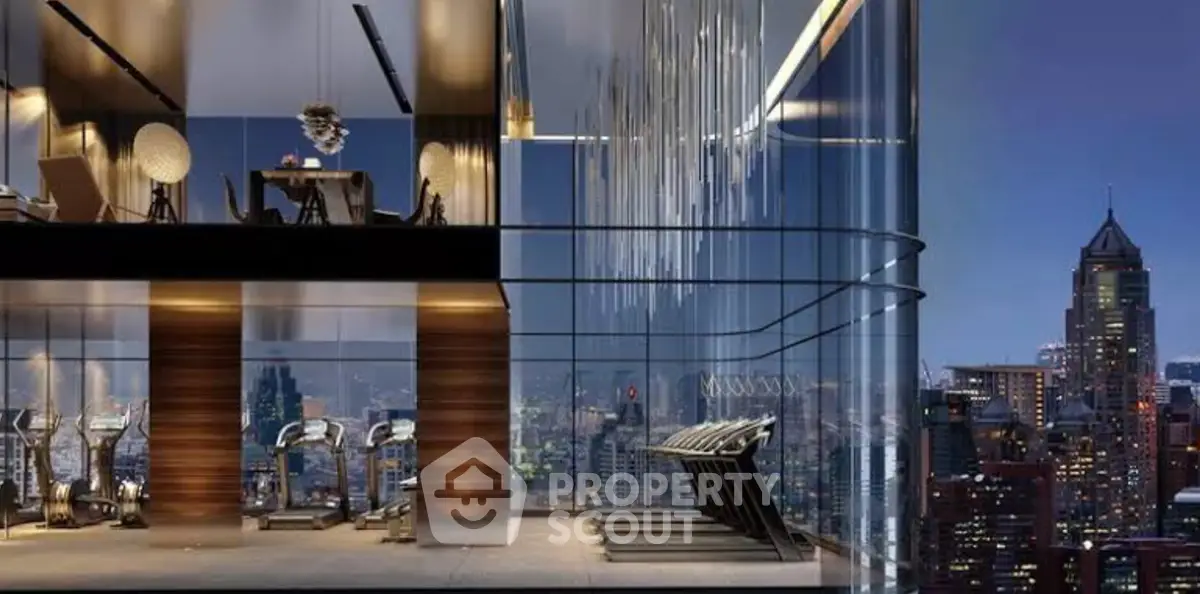 Luxurious high-rise gym with stunning city skyline view at night.
