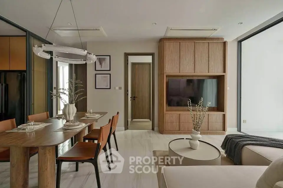 Modern living room with elegant dining area and stylish decor