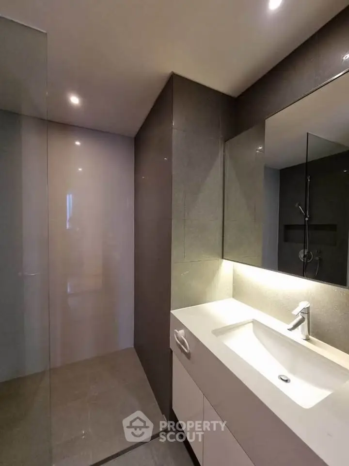 Modern bathroom with sleek design and spacious shower area
