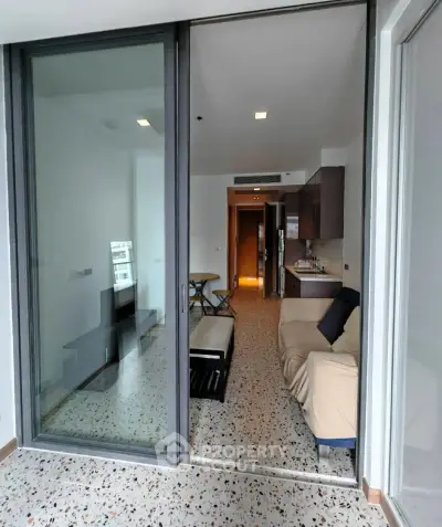 Modern apartment with open living area and sleek kitchen design