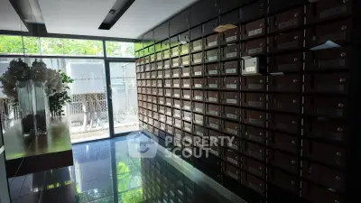 Modern apartment building mailroom with sleek design and natural light