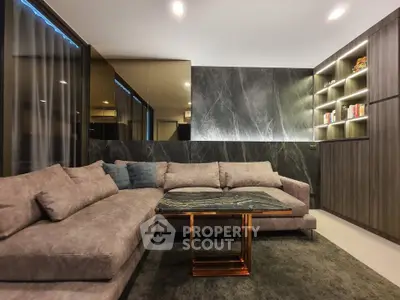 Luxurious modern living room with elegant sofa and stylish shelving