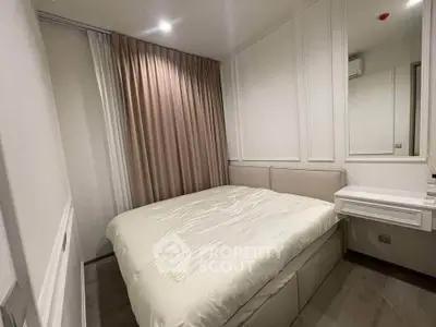 Cozy modern bedroom with elegant decor and soft lighting, perfect for relaxation and comfort.
