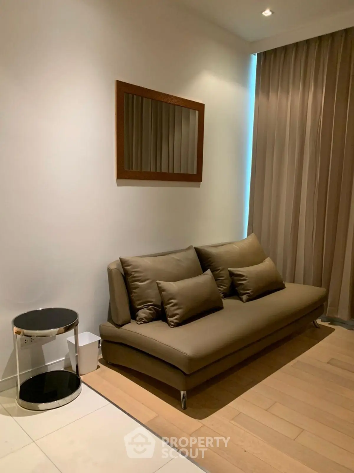 Modern living room with sleek sofa and elegant decor