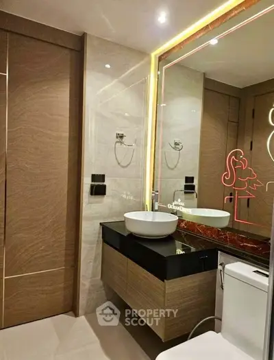 Luxurious modern bathroom with elegant fixtures and stylish lighting