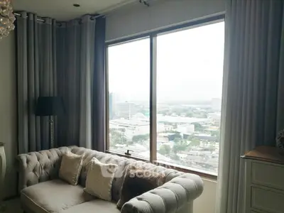 Luxurious living room with panoramic city view and elegant sofa