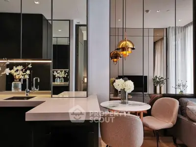 Modern open-plan living room with stylish decor and elegant lighting