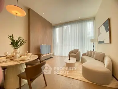 Luxurious modern living room with elegant furniture and large windows