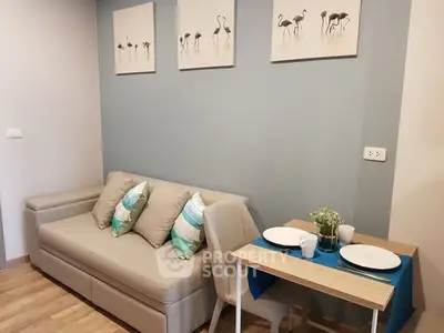 Cozy living room with stylish decor and dining area, perfect for modern living.