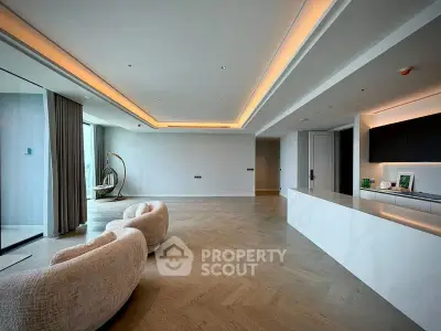 Spacious modern living room with elegant lighting and open layout