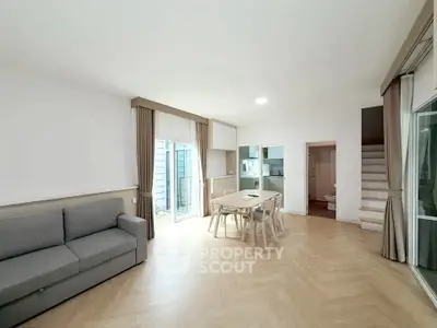 Spacious modern living room with open layout and natural light