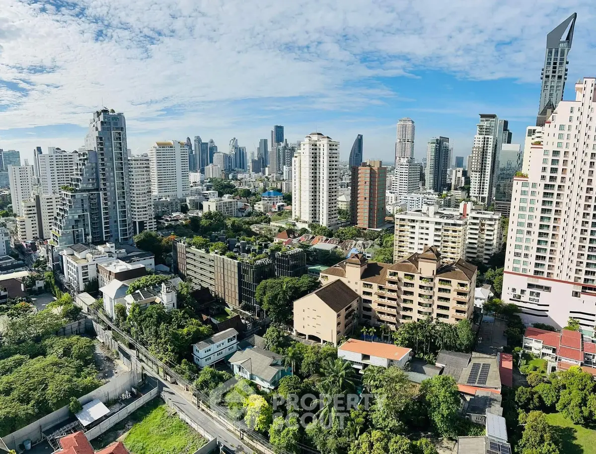 Stunning cityscape view showcasing modern high-rise buildings and lush greenery, perfect for urban living.