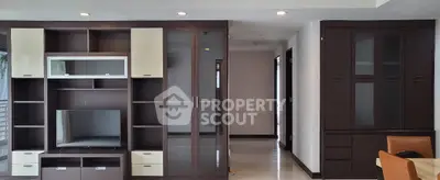 Spacious living room with modern built-in cabinets and sleek design