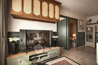 Charming living room with stylish decor and modern entertainment setup