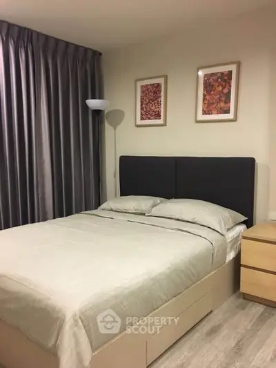 Cozy bedroom with modern decor and stylish furnishings, perfect for relaxation and comfort.