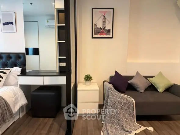 Modern studio apartment with stylish decor and cozy living area