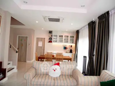 Spacious living room with dining area and cozy decor