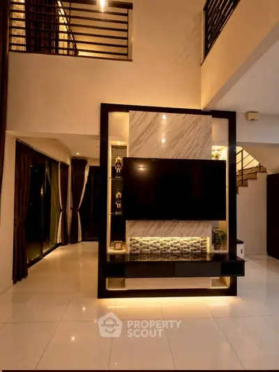 Luxurious modern living room with high ceilings and elegant decor