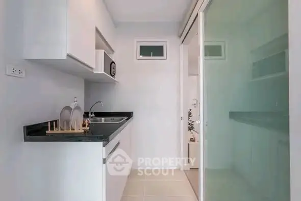 Modern compact kitchen with sleek design and efficient layout