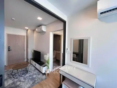 Modern living room with air conditioning and stylish decor in a contemporary apartment.