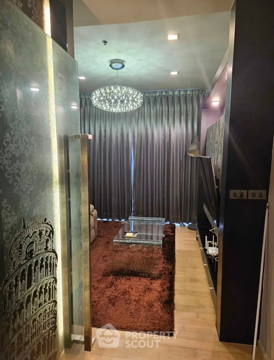 Luxurious living room with elegant chandelier and modern decor