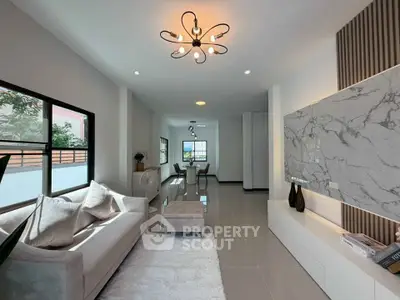 Spacious modern living room with elegant decor and natural light