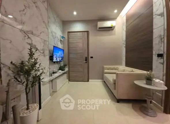 Luxurious modern living room with marble walls and stylish furniture