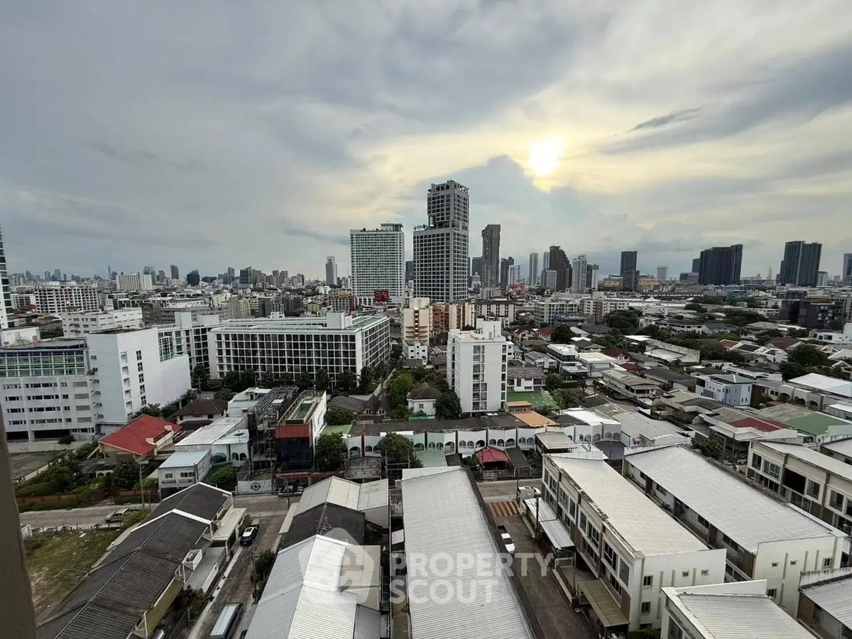 Stunning cityscape view from high-rise building at sunset