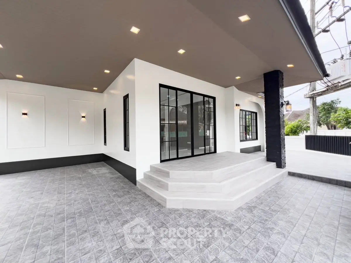 Modern exterior with sleek design and spacious entrance