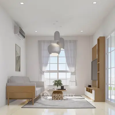Modern living room with stylish furniture and natural light, featuring a cozy sofa and elegant decor.