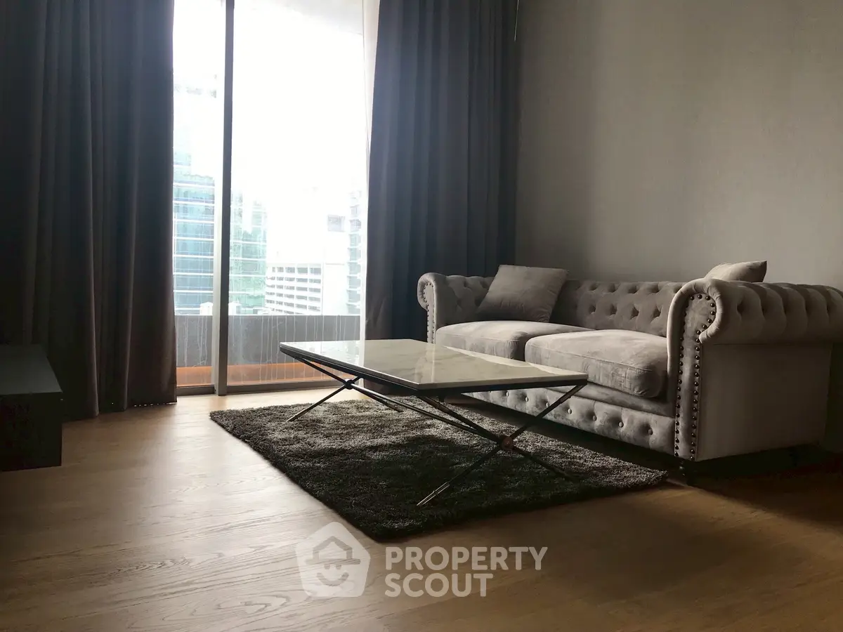 Stylish modern living room with plush sofa and city view
