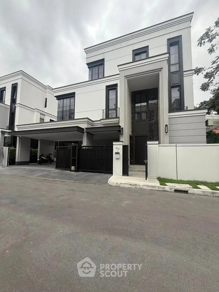 Luxurious modern villa with sleek design and spacious driveway
