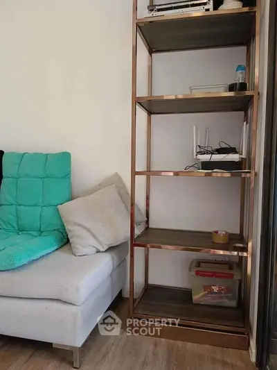 Modern living room with stylish shelving and cozy seating area