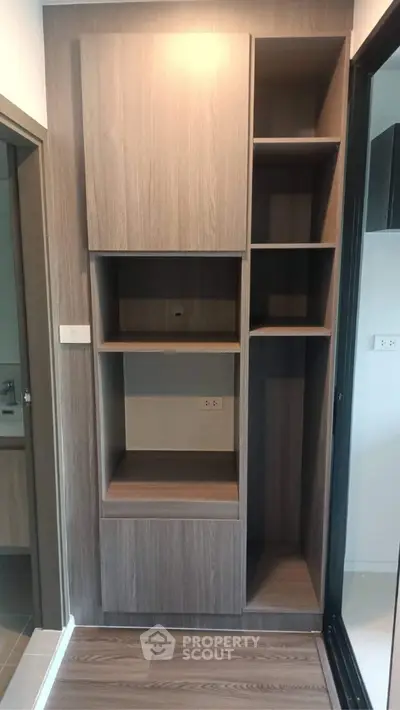 Modern wooden storage unit in a contemporary apartment interior
