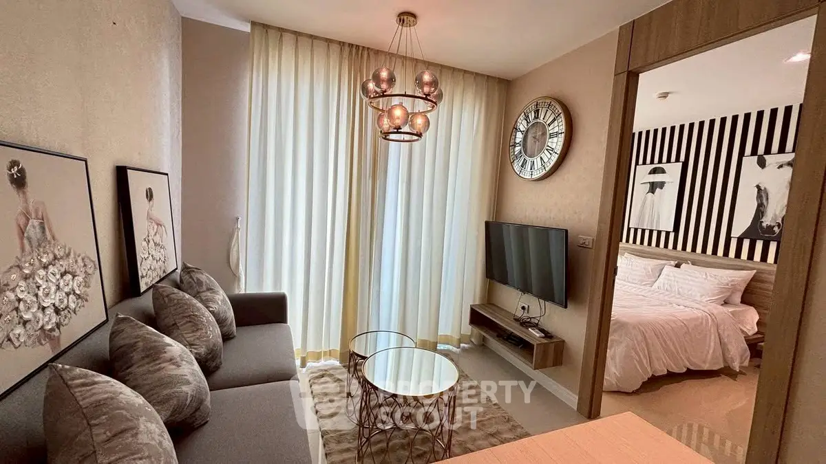 Stylish modern living room with elegant decor and cozy bedroom view