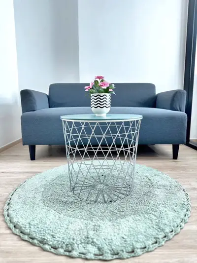 Modern living room with stylish sofa and chic coffee table, perfect for contemporary urban living.