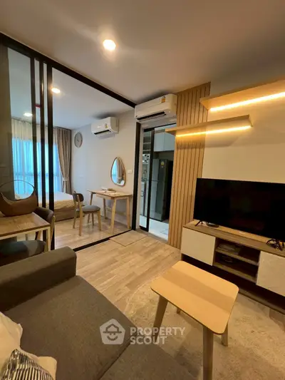 Modern living room with open layout and stylish decor in a cozy apartment