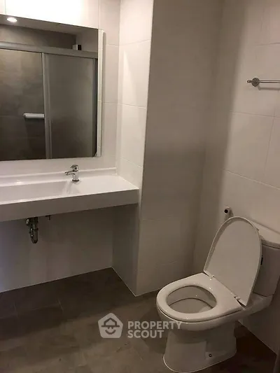 Modern bathroom with sleek fixtures and spacious layout